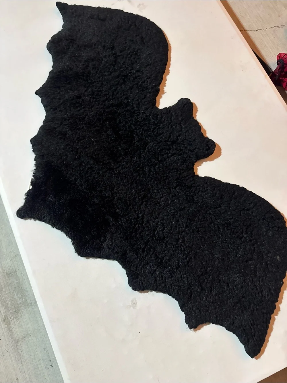 Sourpuss: Furry Bat Rug Black Faux Sheepskin Shag 20x40in